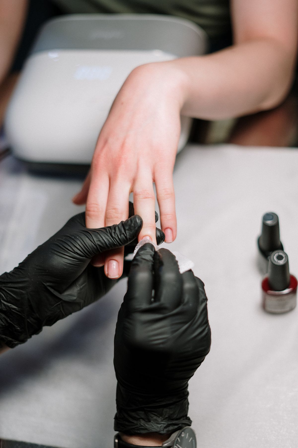 Manicure application at US Nails, Renton